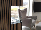 Foco Corner Left 1000 - Modern corner bioethanol fireplace with a sleek black frame and vibrant flames.