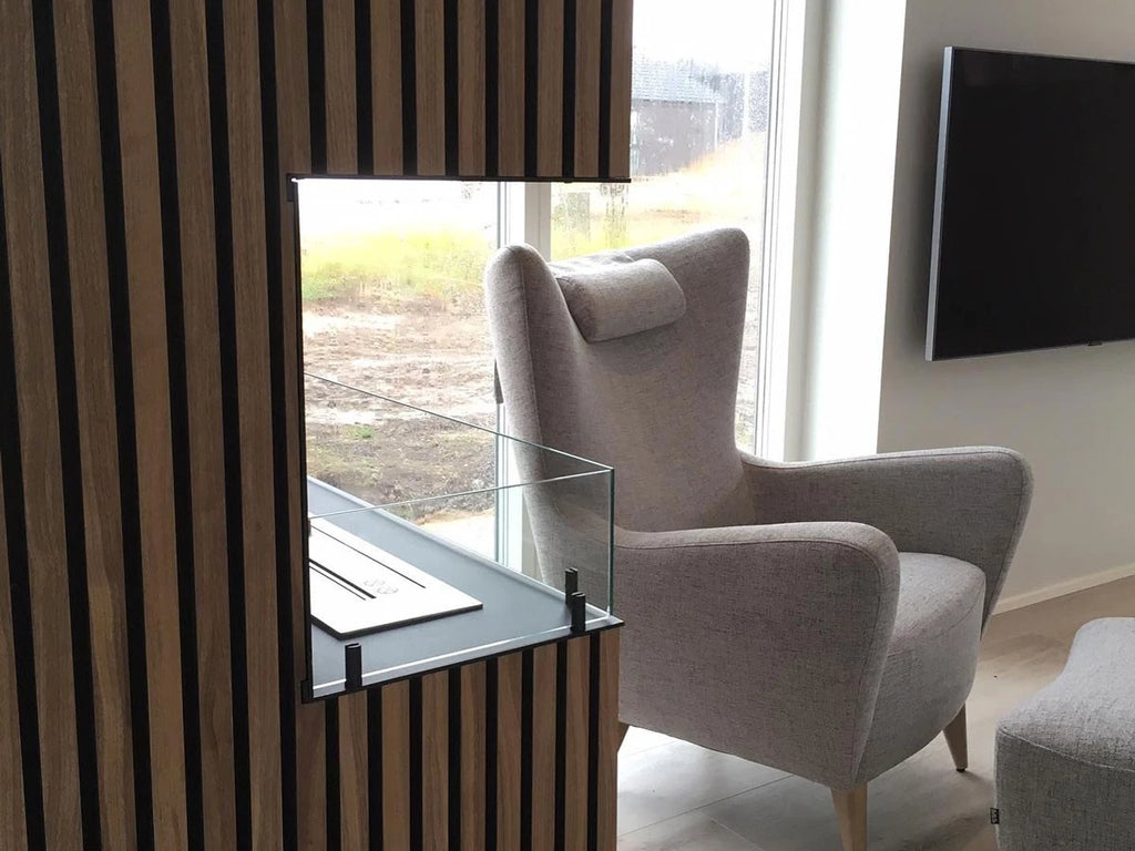 Foco Corner Left 1200 - Modern corner bioethanol fireplace with a sleek black frame and vibrant flames.