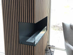 Foco Corner Left 1200 - Modern corner bioethanol fireplace with a sleek black frame and vibrant flames.