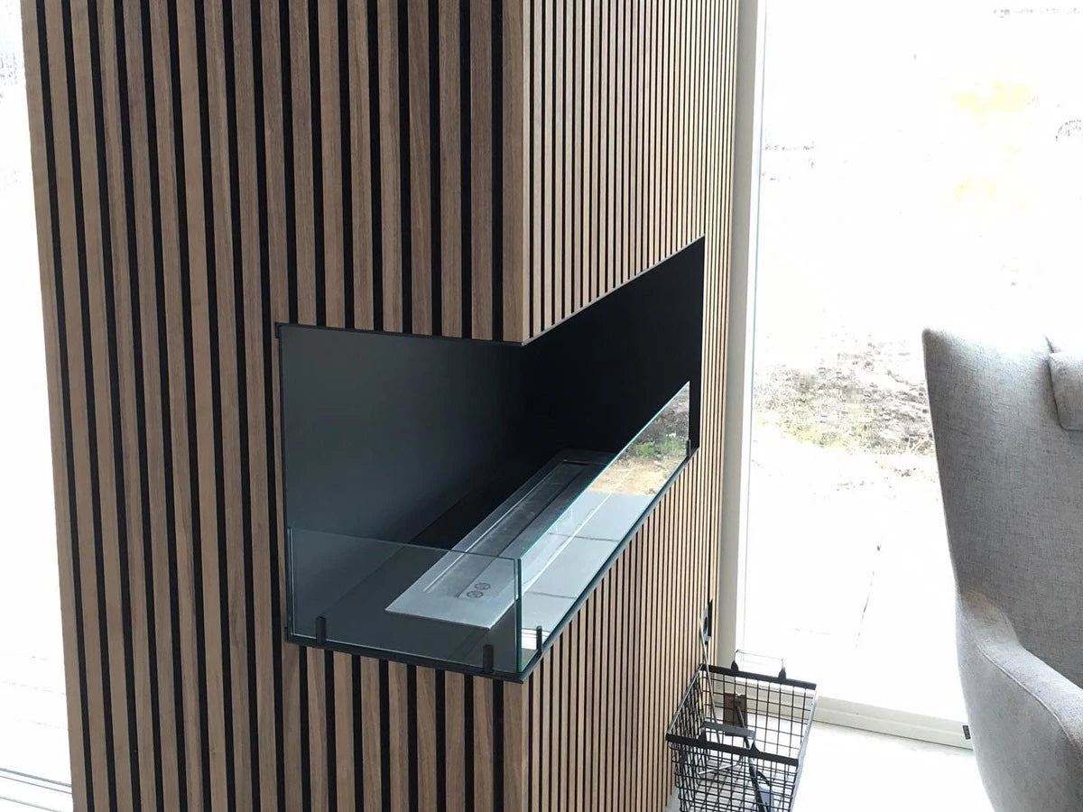 Foco Corner Left 1200 - Modern corner bioethanol fireplace with a sleek black frame and vibrant flames.