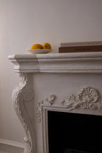 Ymir freestanding bioethanol fireplace with grey polystone surround