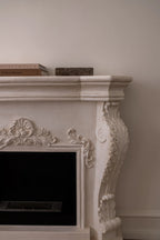 Ymir freestanding bioethanol fireplace with grey polystone surround