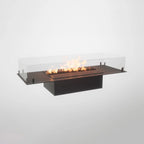Foco Free 1000 – a sleek, 4-sided bioethanol fireplace with tempered glass panels and customisable burner options.