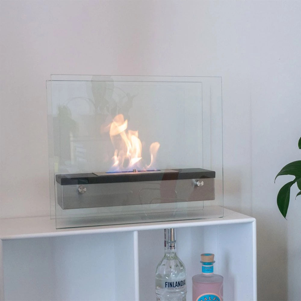 Steel and glass tabletop bio fireplace in square design