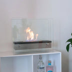 Steel and glass tabletop bio fireplace in square design