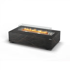 Planika Cabo bioethanol firaplace table with a frame of Cosentino dekton marble plates in Daze or Laurent finish