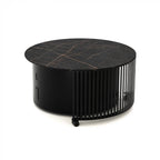 Planika Pivot outdoor patio fire pit table with a Dekton Marble finish in black or white